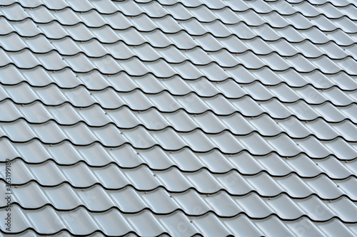 Modern grey roof made of corrugated metal © graja