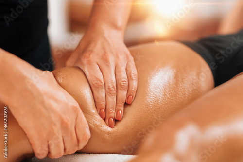 Anti Cellulite Thigh Massage in a Beauty Spa Salon.