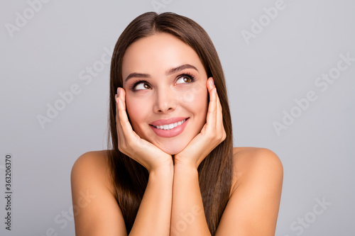 Close-up portrait of her she nice-looking attractive charming cute dreamy cheerful cheery straight-haired girl natural effective therapy treatment isolated over gray pastel color background