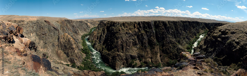 Beautiful Charyn river canyon. Summer landscape background. Summer river valley landscape. Travel in Kazakhstan. Beautiful Charyn river canyon. Summer landscape background. Summer river valley landscape. Travel in Kazakhstan.