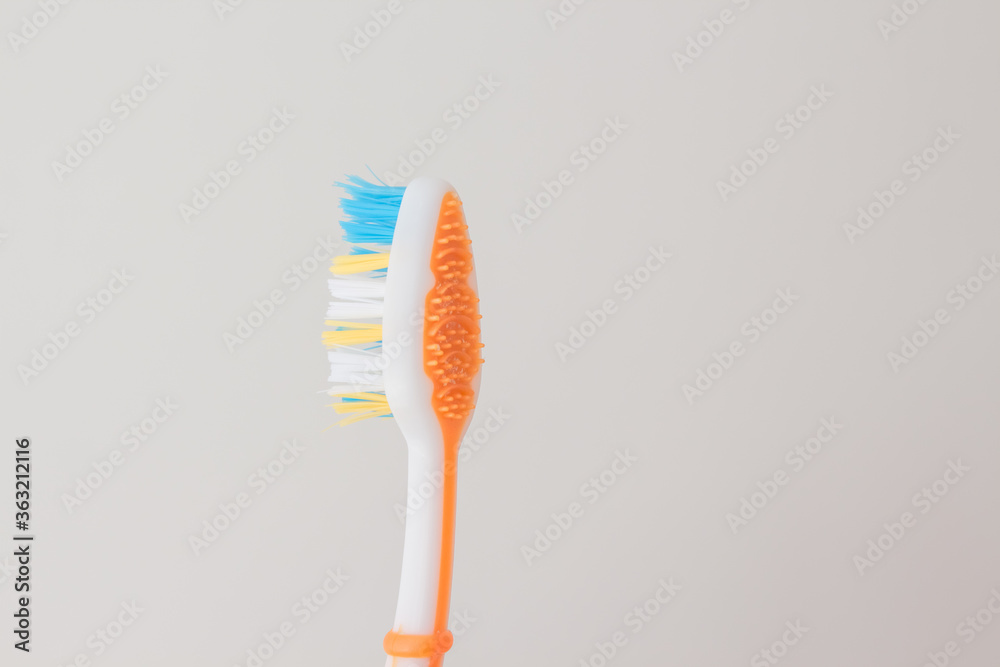 Toothbrush for cleaning the tongue close-up on a white background Toothbrush for cleaning the tongue close-up on a white background