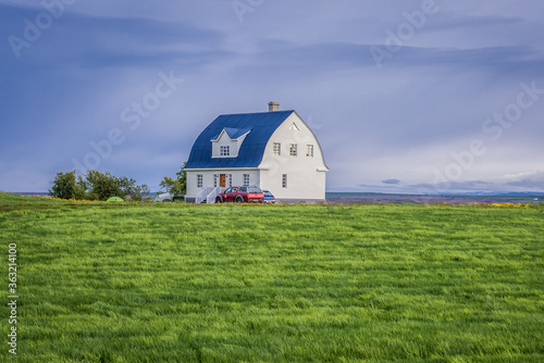 Distance view of house on a farm in Skutustadir village, Iceland