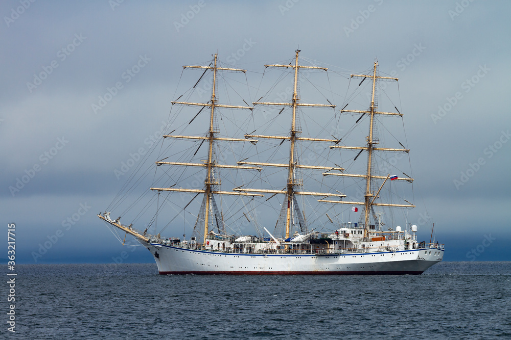 sailboat in the Amur Bay on the background of fog sailboat in the Amur Bay on the background of fog