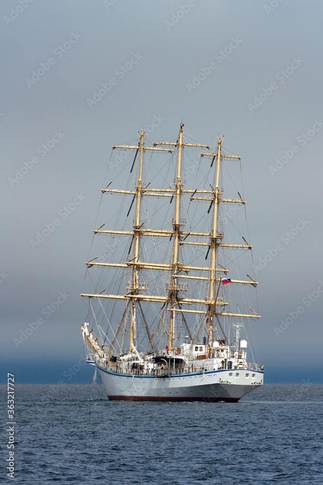 sailboat in the Amur Bay on the background of fog sailboat in the Amur Bay on the background of fog