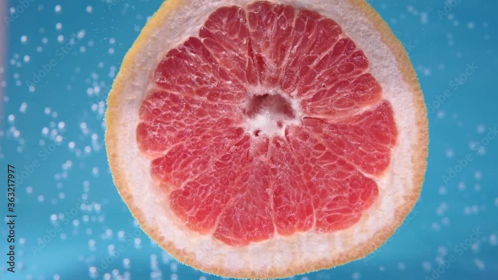 grapefruit citrus fruit in the water under the water. Juicy fruit for juice grapefruit citrus fruit in the water under the water. Juicy fruit for juice
