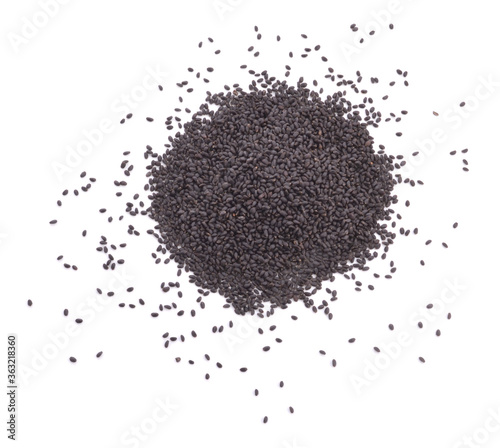 Pile of organic black sesame seeds isolated on white background