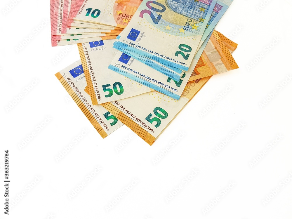 Paper money euro on a white background. View from above. Bribe. Duty. Repayment of the loan. Paper money euro on a white background. View from above. Bribe. Duty. Repayment of the loan.
