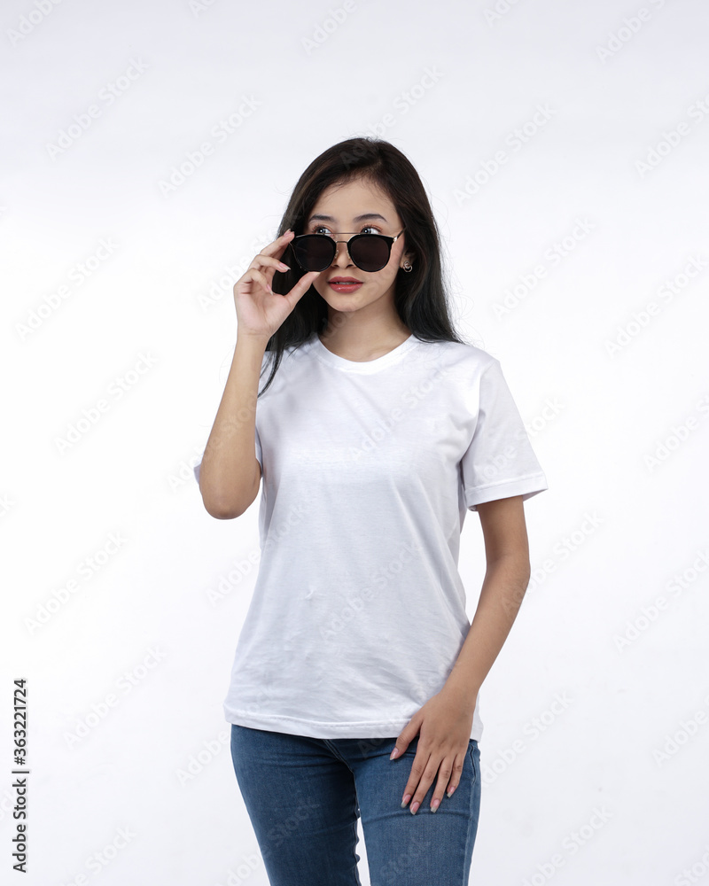 Front view white t-shirt Closeup on female body, woman girl in empty white t-shirt isolated on white background. Design woman t-shirt template and mockup for print. Front view white t-shirt Closeup on female body, woman girl in empty white t-shirt isolated on white background. Design woman t-shirt template and mockup for print.