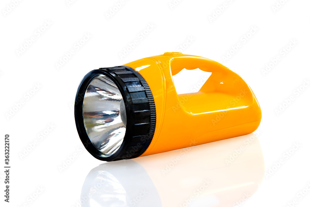 Yellow flashlight isolated on the white background with clipping path Yellow flashlight isolated on the white background with clipping path