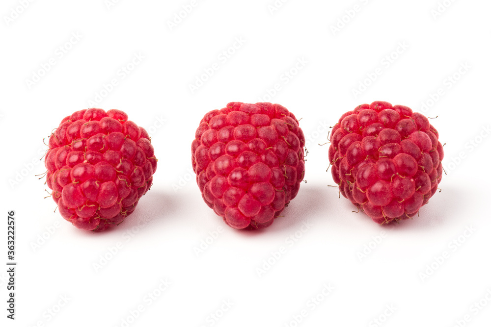Fresh red raspberry isolated on white background. Berry in close-up Fresh red raspberry isolated on white background. Berry in close-up