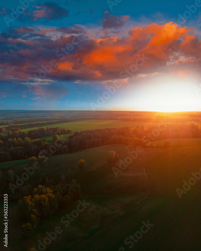 Top aerial view of green fi...