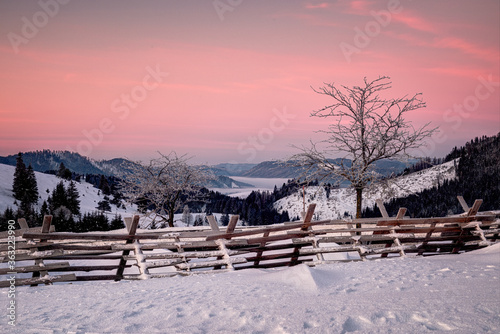 beautiful snowy landscape with valleys, lakes and rivers