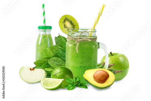 Smoothie vitamin drink made with green fruits and vegetables. Isolated on white background.