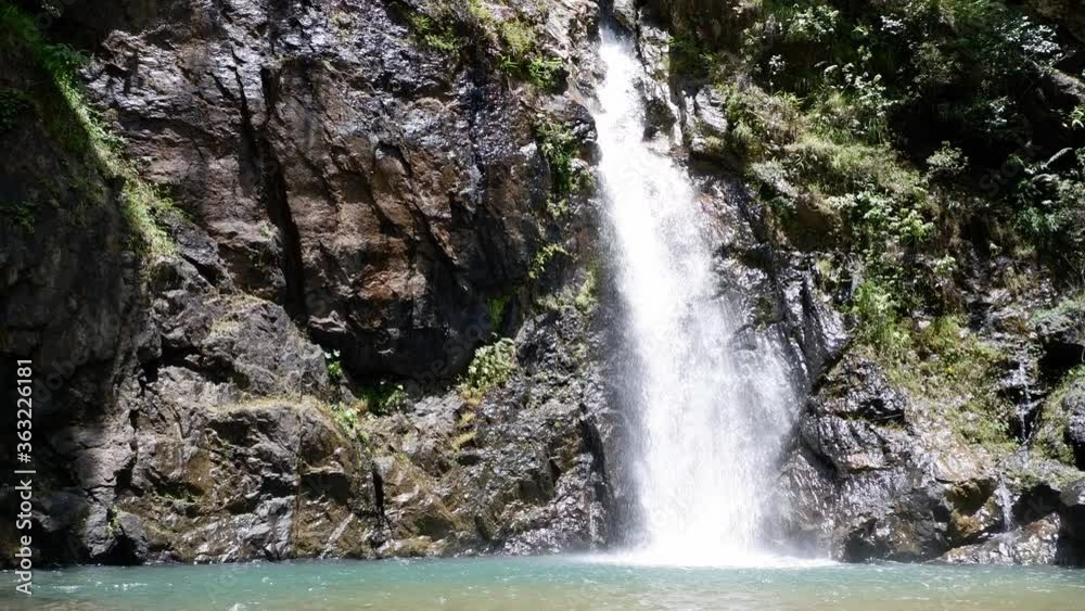 Waterfall flowing from the mountains at Jokkradin waterfall in Thong Pha Phum National Park, Kanchanaburi in Thailand. Waterfall flowing from the mountains at Jokkradin waterfall in Thong Pha Phum National Park, Kanchanaburi in Thailand.