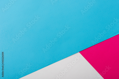 abstract geometric background with white, pink, blue paper