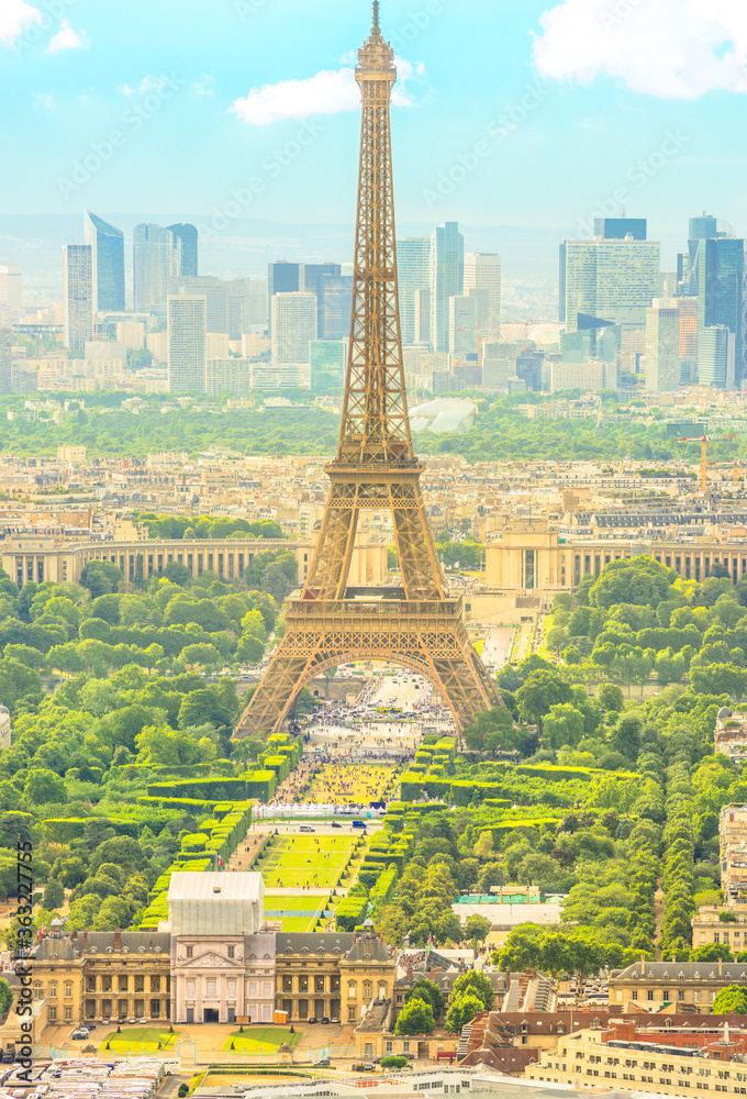Obraz premium vertical frame cityscape of Paris with Eiffel Tower on background. Seasonal picturesque background in spring. Scenic wallpaper with Eiffel Tower. Vertical shot.