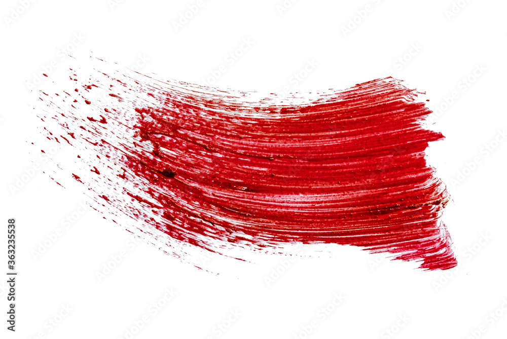 Stain swatch of a red matte lipstick on white background Stain swatch of a red matte lipstick on white background