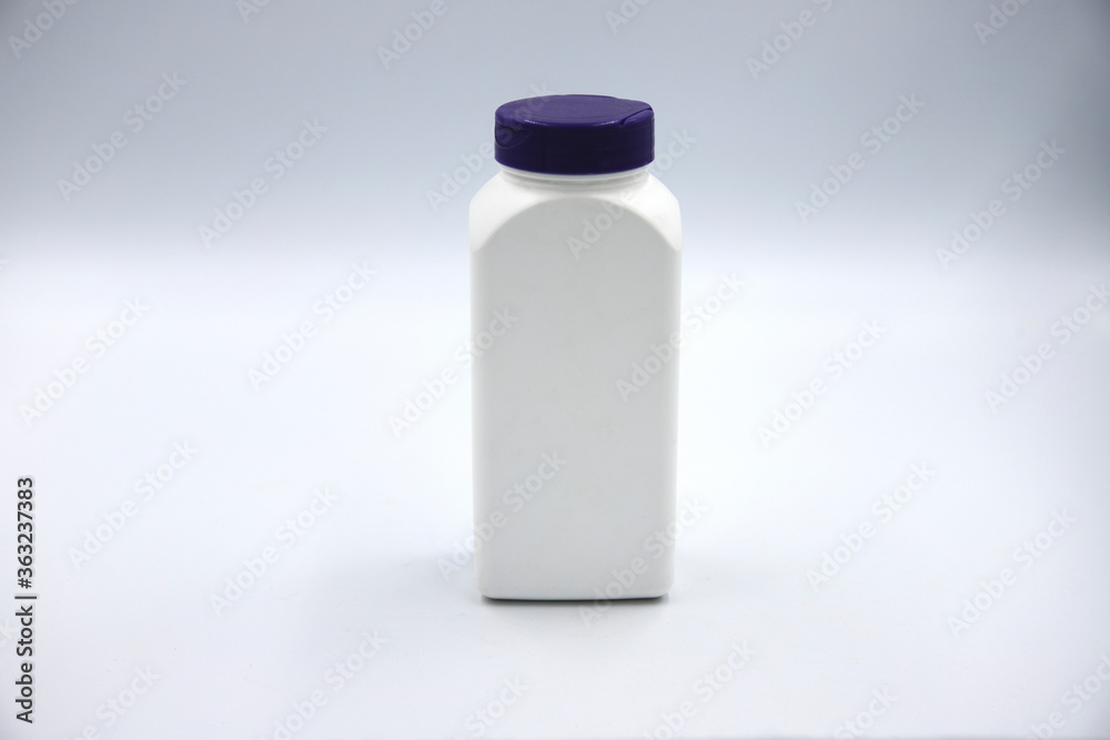 White plastic bottle for pills or food supplement studio photo on white background. Pharmacologic package mockup. Plastic container pill or capsule. Vitamin for diet pack. Healthcare pill jar White plastic bottle for pills or food supplement studio photo on white background. Pharmacologic package mockup. Plastic container pill or capsule. Vitamin for diet pack. Healthcare pill jar
