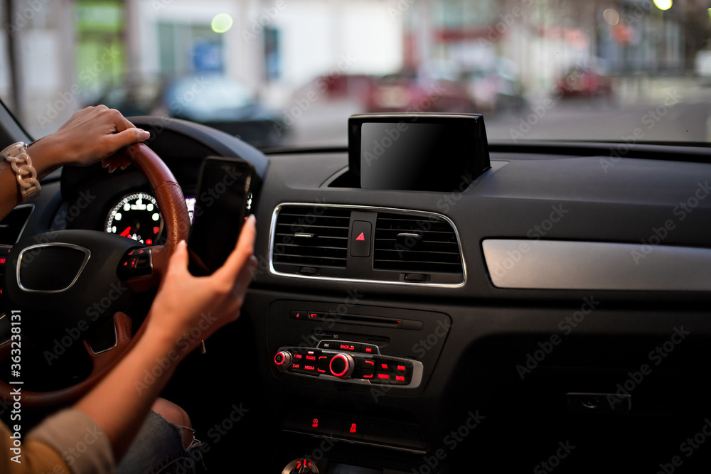 Template for Mobile phone magnet car mount phone holder, for GPS. Lifestyles photo in car. Interior, front view. With woman hand holding phone. Different angels. Template for Mobile phone magnet car mount phone holder, for GPS. Lifestyles photo in car. Interior, front view. With woman hand holding phone. Different angels.