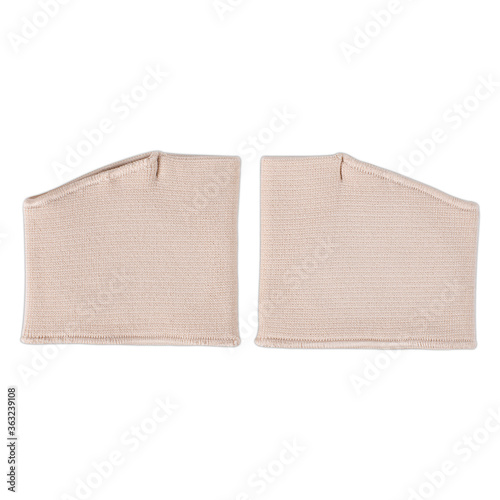 Metatarsal Sleeve Gel Pads on couch. White background
