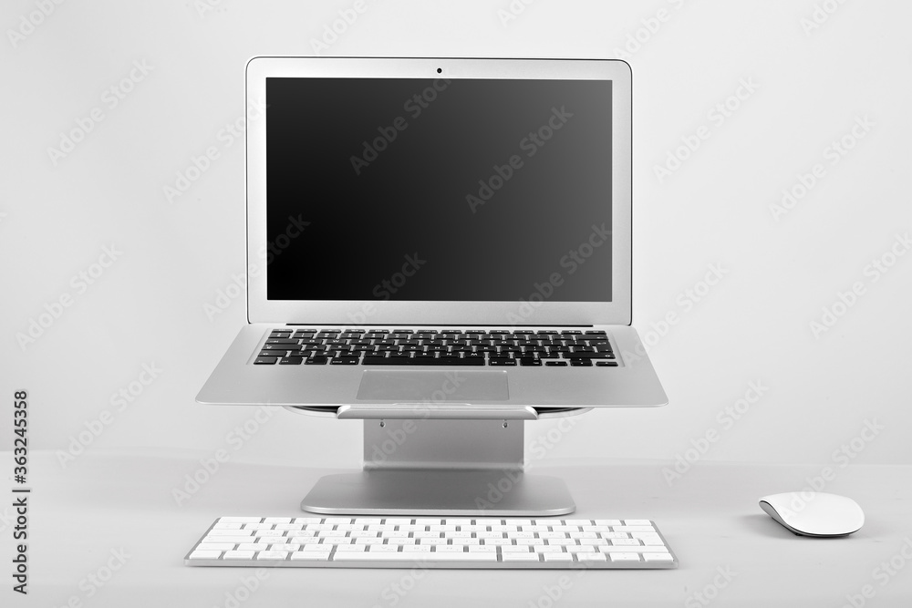 Laptop computer black blank screen on work table side view. Laptop computer black blank screen on work table side view.