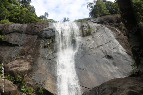 View of beautiful tropical waterfall from stone at langkawi  Malaysia 