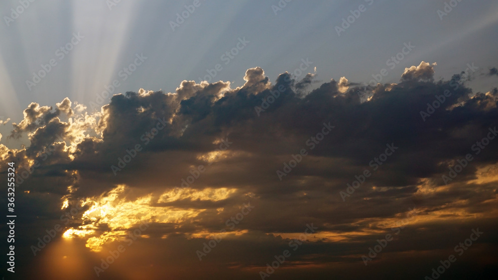 Blue sky with clouds background and sunshine, background