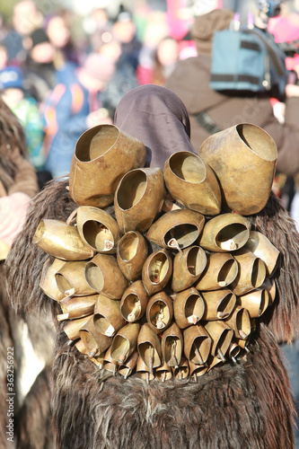 Moscow Maslenitsa Festival 2020. Traditional celebration in folk style. Sardinian masked artists: mamuthones, isohadores from Sardinia, Italy. Ethnic clothes, costumes photo