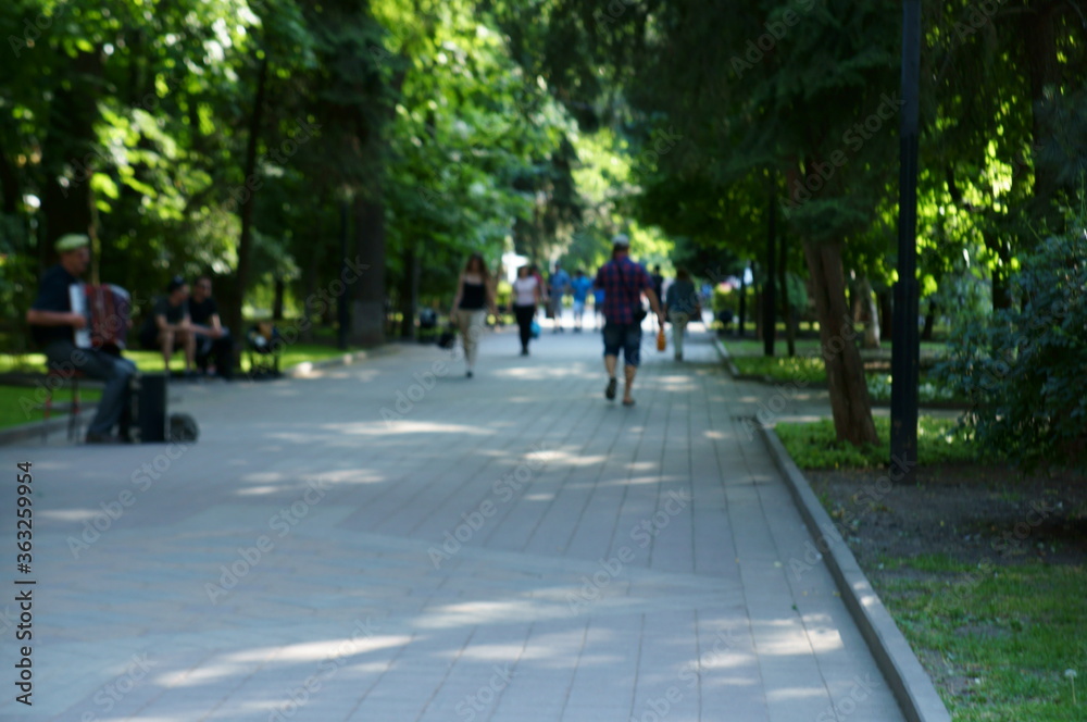 people walking in the park people walking in the park