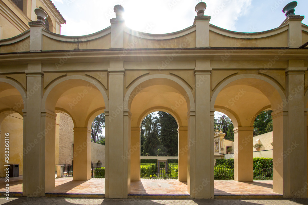 Fototapeta premium Arcade in a courtyard of the Real Alcazar Palace in Seville, Spain