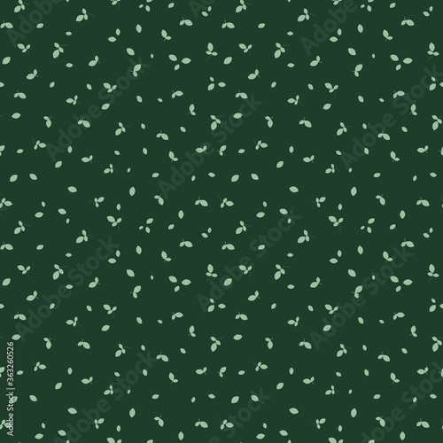 Vector seamless pattern with small scattered green leaves. Simple minimal botanical background. Natural wallpapers. Subtle leaf texture. Green tea. Repeat design for decor, print, wrapping, fabric