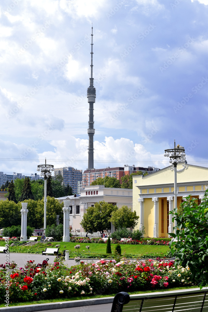 Moscow, Russia - July 2, 2020: View of Ostankino Tower from VDNKh park. Moscow TV tower against the overcast sky