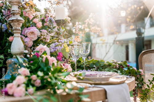An elegant wedding table setting in the garden.