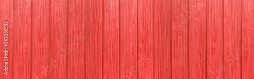 Panorama of Vintage style wooden fence painted red texture and seamless background