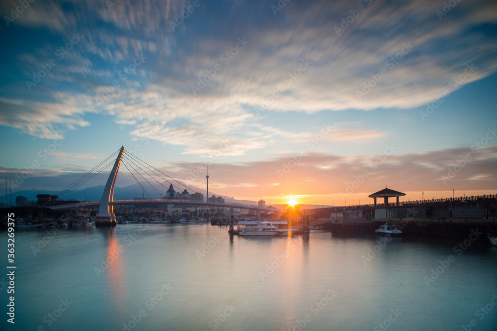 Naklejka premium sunset over the river