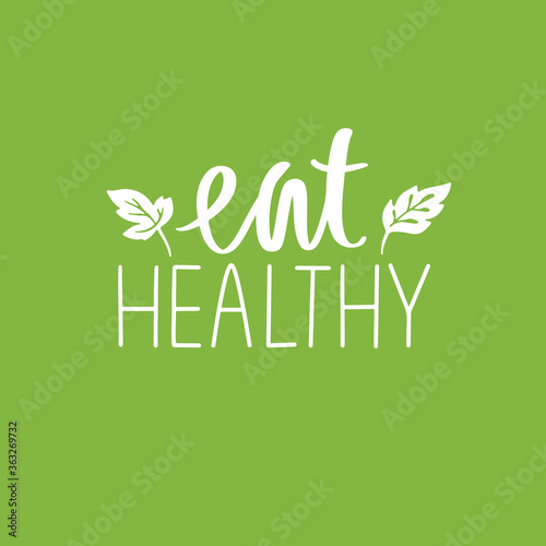 Eat healthy. Vector hand drawn lettering quote about healthy food. Calligraphy phrase isolated on white.