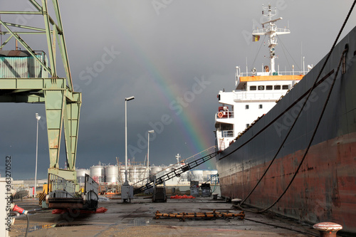 container ship in the dry dock for overall control photo