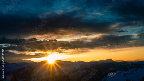 Sunrise over the mountains of the Himalayan range of India, amazing view of the Himalaya in winter trek to Kedarkantha peak.