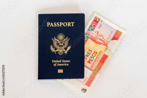 American passport and convertible cuban peso currency. Concept photo for American trade, commerce, business, and tourism with Cuba. photo