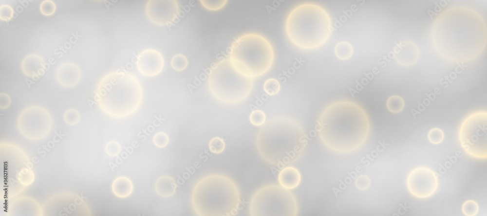 Silver bokeh background. Christmas glowing silver and golden lights with sparkles. Holiday decorative effect.