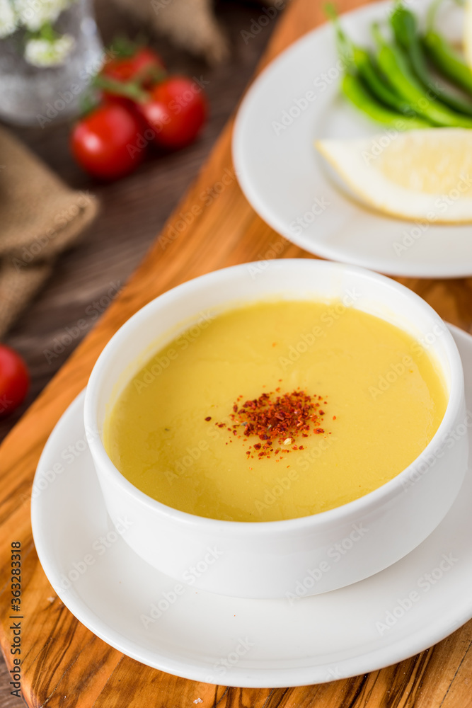 Red lentil soup. Traditional middle eastern, turkish , ramadan cuisine. Vegan food . Top view Red lentil soup. Traditional middle eastern, turkish , ramadan cuisine. Vegan food . Top view