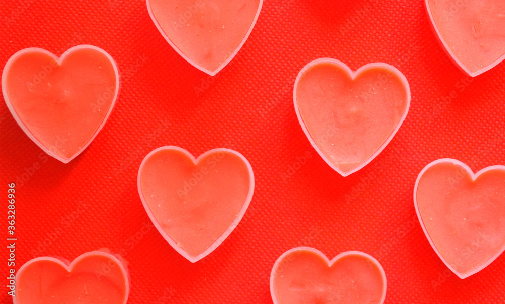 Valentine day pink hearts on red background.