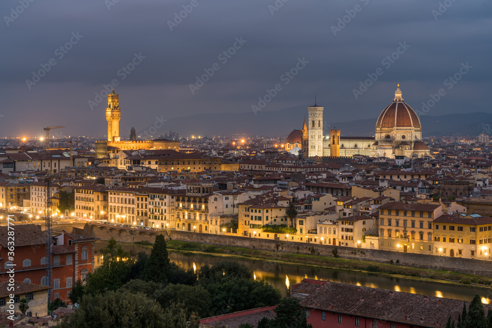 Florence old city skyline at night with Cathedral of Santa Maria del Fiore in Florence, Tuscany, Italy.