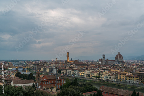 Florence old city skyline at sunset with Ponte Vecchio over Arno River and Cathedral of Santa Maria del Fiore in Florence, Tuscany, Italy. © kanonsky