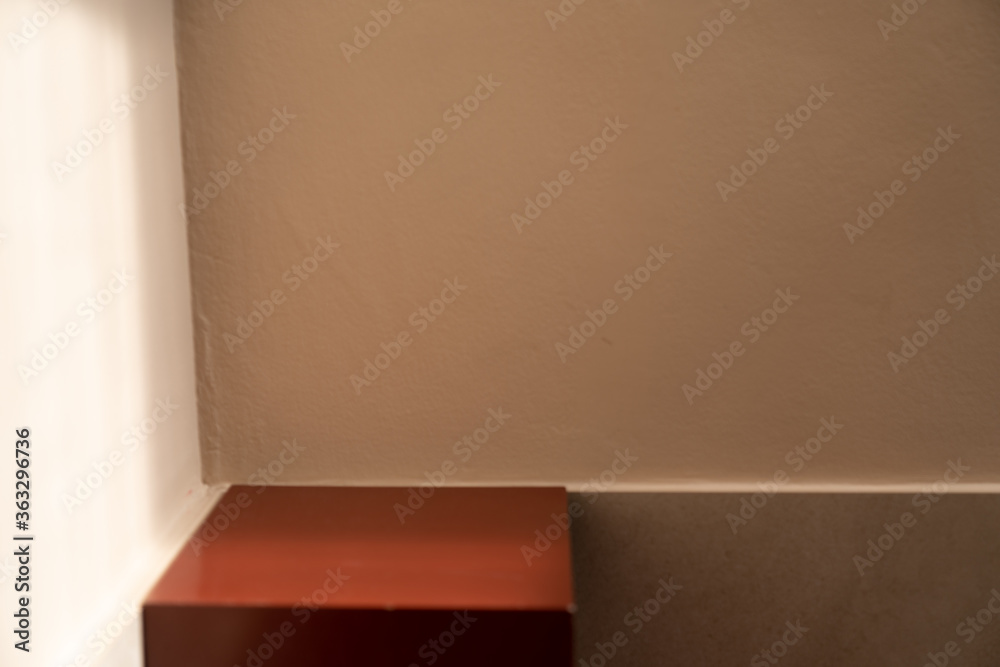 Minimal empty space scene with red stair and pink wall in shade for photoshoot / studio concept / outdoor studio / modern minimal style Minimal empty space scene with red stair and pink wall in shade for photoshoot / studio concept / outdoor studio / modern minimal style