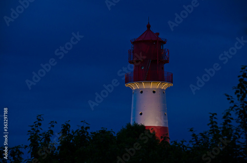 A small and beautiful lighthouse iat night in Falshöft, Germany