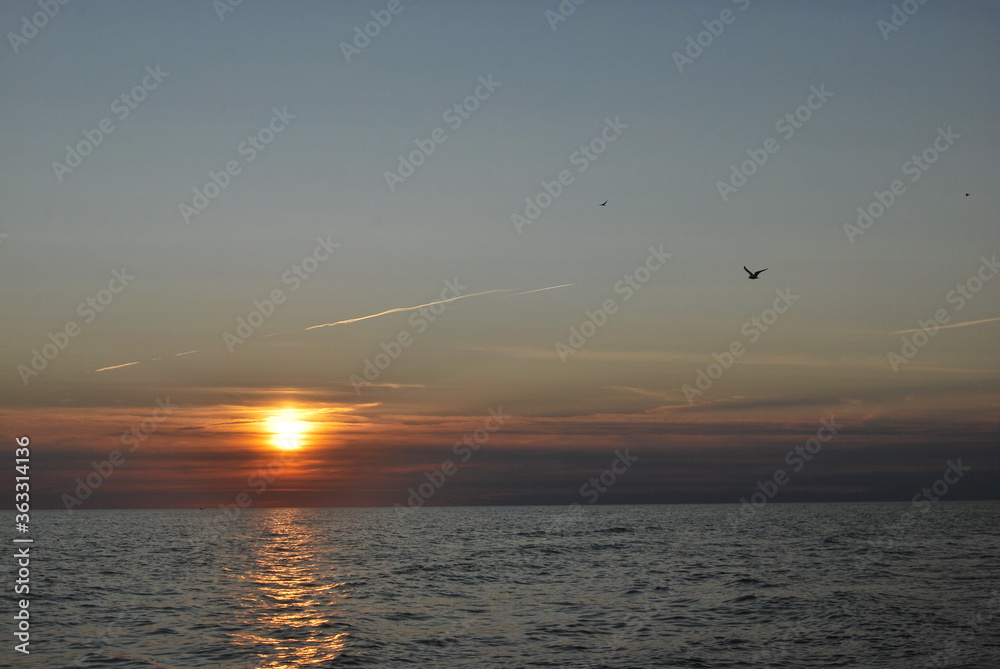 Sunset over the sea. Sunset over the sea.