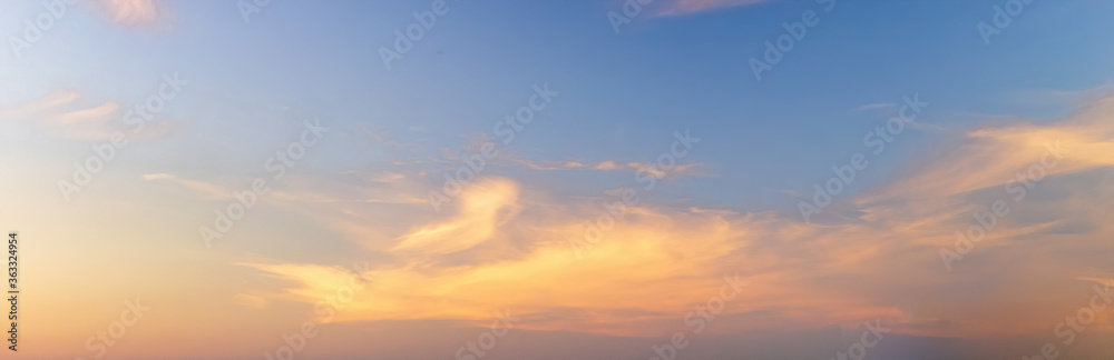 Light soft panorama sunset sky background with clouds illuminated by sun Light soft panorama sunset sky background with clouds illuminated by sun