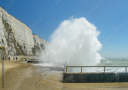 stormy seas and crashing waves at the seafront in Rottingdean England photo