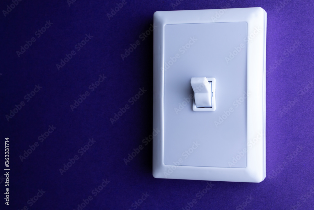 White switch on a blue background in the upper position White switch on a blue background in the upper position